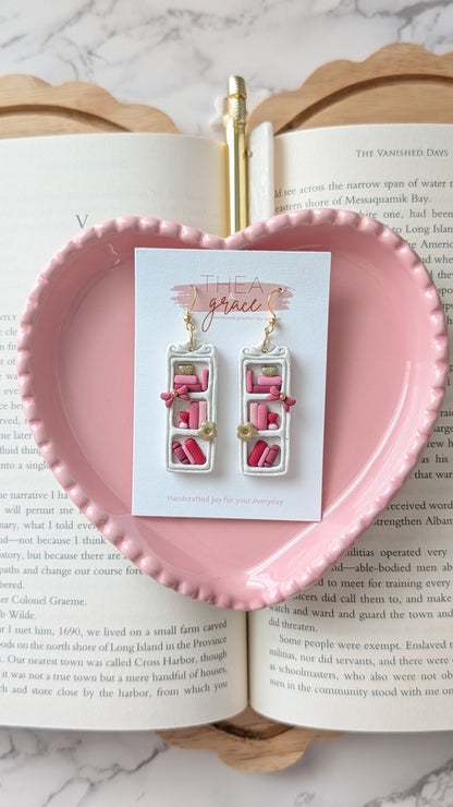 SPECKLED WHITE SHELF & PINK BOOKS DANGLES
