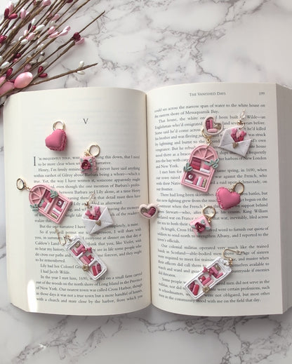 LT. PINK ARCHED BOOKSHELF DANGLES