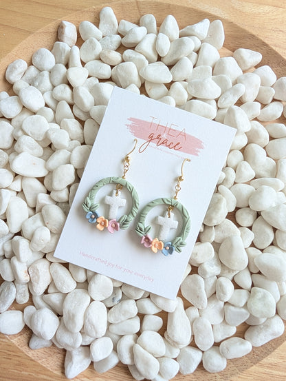 FRAMED CROSS DANGLES