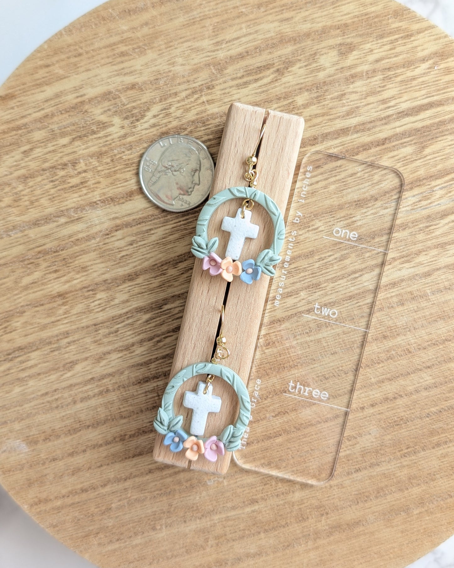 FRAMED CROSS DANGLES